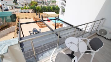 Deluxe Triple Room, Pool View | Balcony