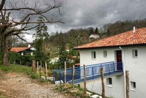Stunning views of the surrounding countryside from this charming residence's balcony.