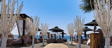 Private beach, black sand, beach bar