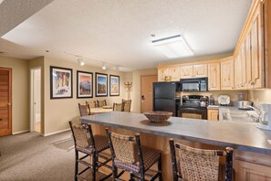 Fridge, microwave, oven, stovetop - North Of Nell, Unit 2k (Aspen)