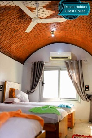 Chambre triple Deluxe, vue sur le fleuve