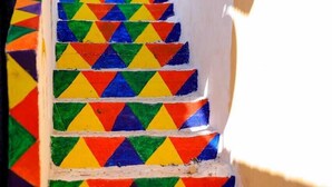 A staircase with colorful triangular patterns. - Dahab Guest House (Aswan)
