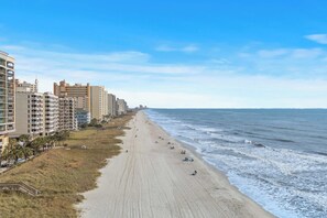 On the beach, beach towels
