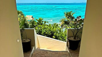 On the beach, sun loungers, beach towels