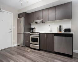 Apartment | Private kitchen | Full-size fridge, coffee/tea maker, freezer