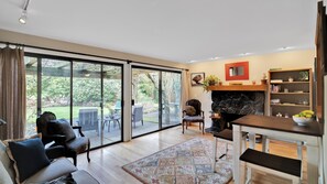 TV, fireplace, books