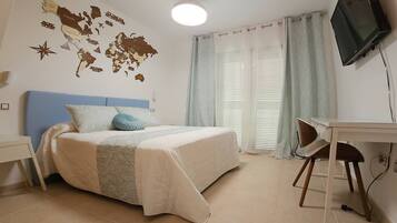 2 bedrooms, desk, iron/ironing board, travel crib