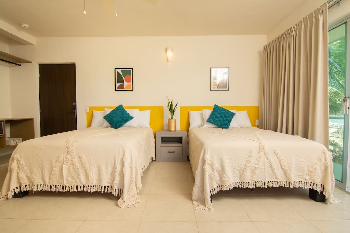 Double Queen Junior Bedroom Ocean View Balcony