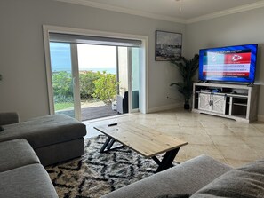 Living area - Backyard Beach House - A Beach Front Luxury Villa by Wulfenite Resorts (Melbourne Beach)