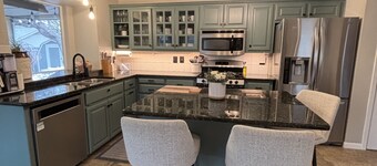 Cozy and cheerful three bedroom home with hot tub.