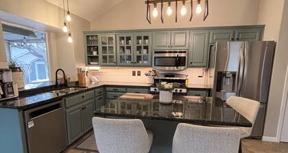 Cozy and cheerful three bedroom home with hot tub.