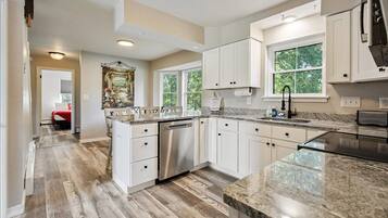 Coffee/tea maker, fridge, microwave, oven