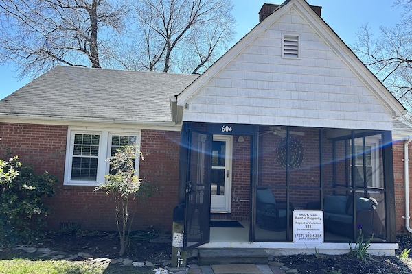 Front of us with a screened in porch.