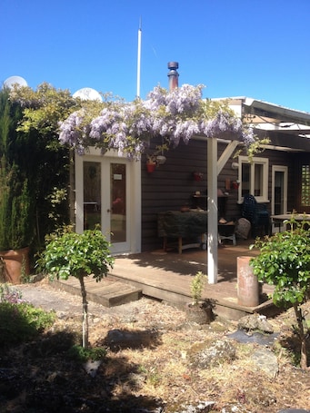 Terrace/patio. Cosy, Comfortable, Rustic Cabin In The Absolute Heart Of The Catlins