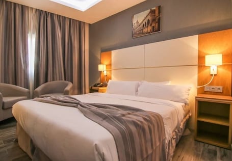 1 habitación, ropa de cama de alta calidad y minibar