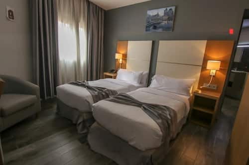 Premium bedding, minibar, laptop workspace, soundproofing