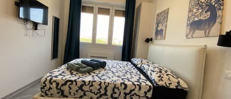 1 Schlafzimmer, Bügeleisen/Bügelbrett, kostenloses WLAN, Bettwäsche