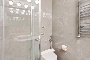 Shower, hair dryer, towels, soap