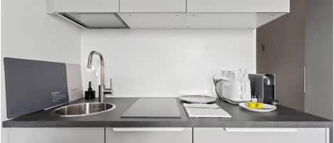 Fridge, microwave, stovetop, coffee/tea maker