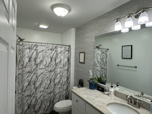 Hair dryer, towels, soap, shampoo