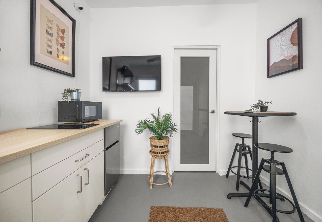 Apartment (2 Bedrooms) | Living area | 50-inch Smart TV with digital channels, books, stereo