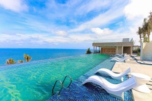 4 outdoor pools, pool umbrellas, sun loungers - Apec Mandala Beach Mui Ne Resort (Phan Thiet)