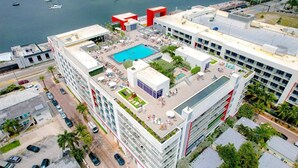 A modern hotel with multiple swimming pools, rooftop terraces, and a view of the sea. - CH Luxury Studio With a Quiet Courtyard View-CS34 (Hollywood)