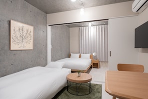 Couette en duvet d'oie, rideaux occultants, Wi-Fi gratuit, draps fournis