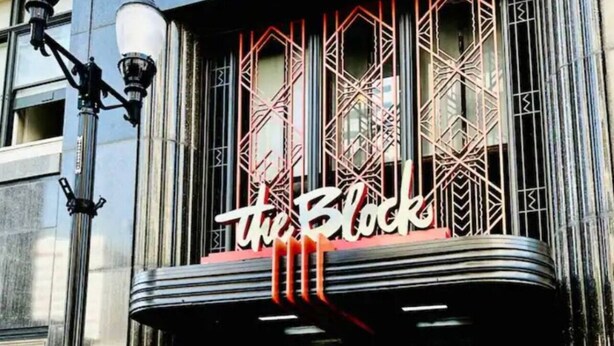 A theater with a marquee reading "The Block" and a classic architectural design. - Luxury, centrally located loft Downtown w/skybridge access to Convention Center (Indianapolis)