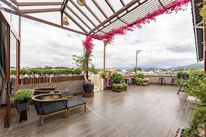 Habitación junior doble, balcón | Terraza o patio