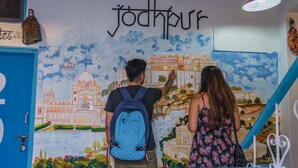 A mural with the word "jodhpur" and illustrations of buildings and landscapes. - Zostel Jodhpur - Clock Tower (Jodhpur)