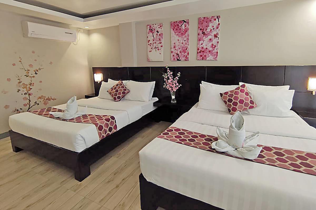 Deluxe vierpersoonskamer | Gratis wifi, beddengoed