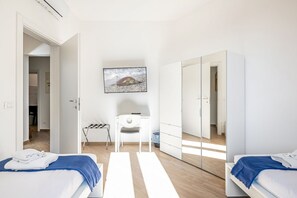 2 habitaciones, tabla de planchar con plancha, wifi y ropa de cama