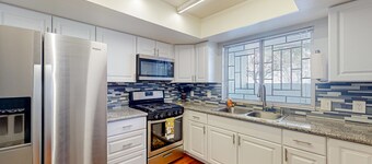 Centrally located retreat with pool, Ping-Pong, balcony, full kitchen, W/D, & AC