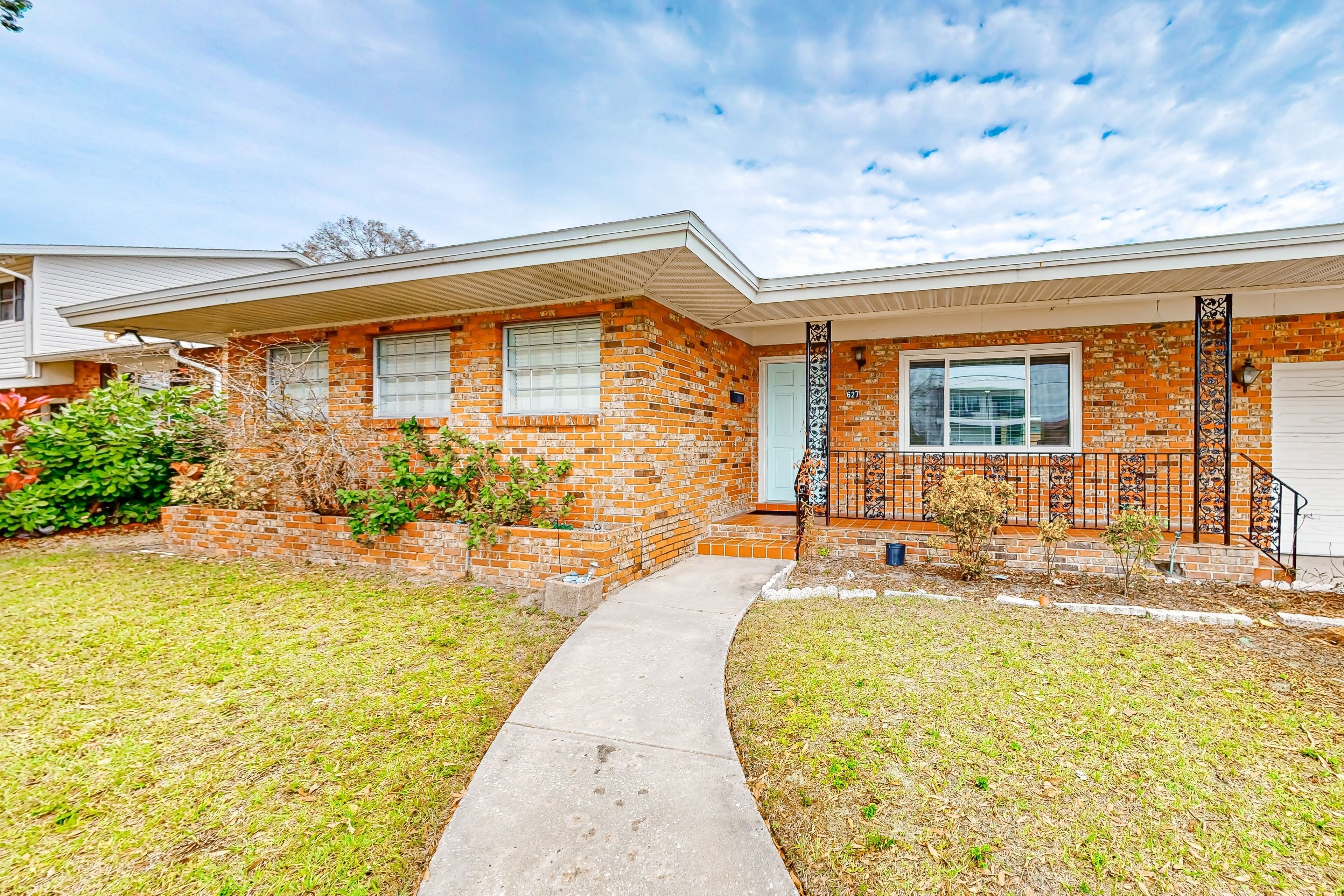 Brick beauty with private yard, BBQ, patio, AC, & W/D