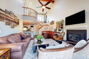 TV, fireplace, books