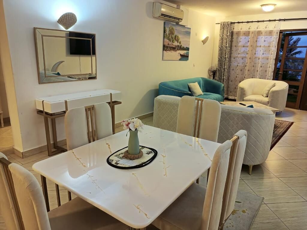 Deluxe Villa | Living area | 24-inch Smart TV with digital channels