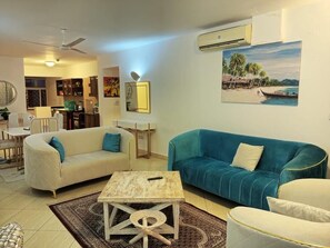 Deluxe Villa | Living area | 24-inch Smart TV with digital channels - Lux Suites Lamera Beachfront Villas  (Mombasa)