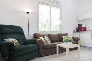 Apartamento | Área de estar | Smart TV 40 polegadas com canais digitais