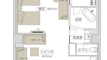 A hotel floor plan with a living room, bedroom, bathroom, and kitchen.