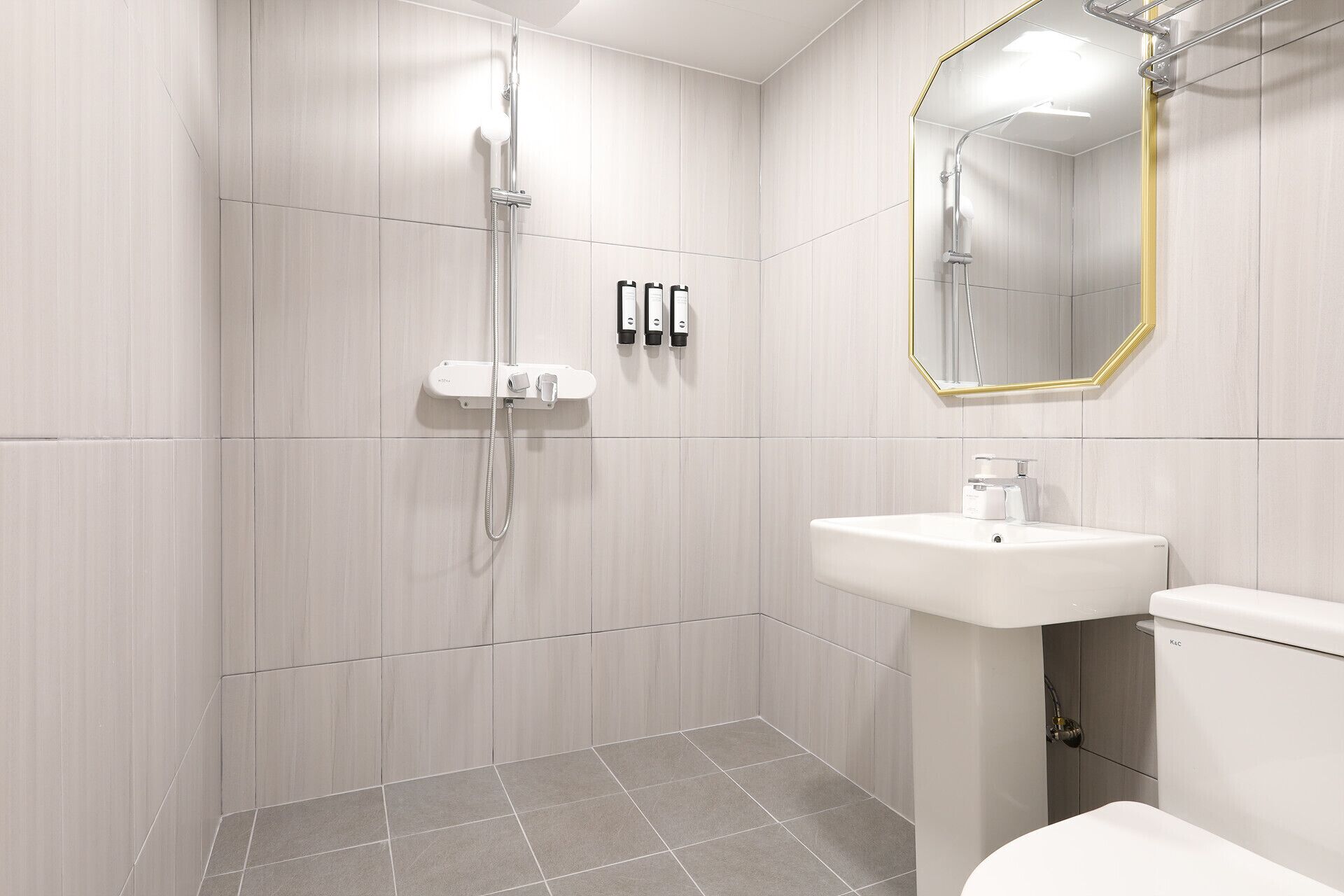 Grand Room | Bathroom | Rainfall showerhead, designer toiletries, hair dryer, bathrobes