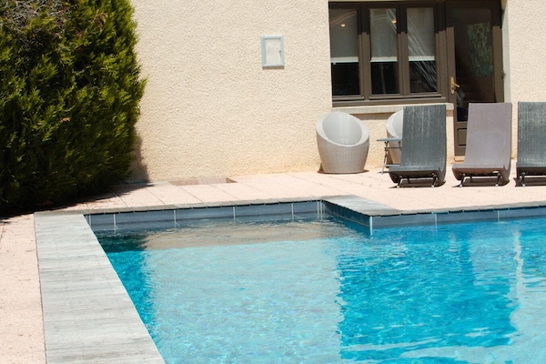 Seasonal outdoor pool, pool umbrellas, pool loungers