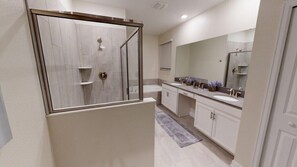 Hair dryer, towels, shampoo, toilet paper
