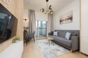 43-inch flat-screen TV with satellite channels - Studio Mennica Residence by Renters Prestige (Warsaw)