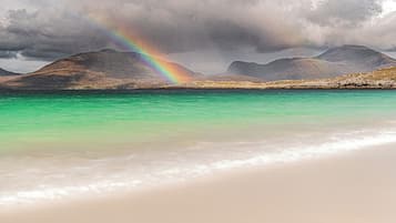 On the beach, sun-loungers, beach towels