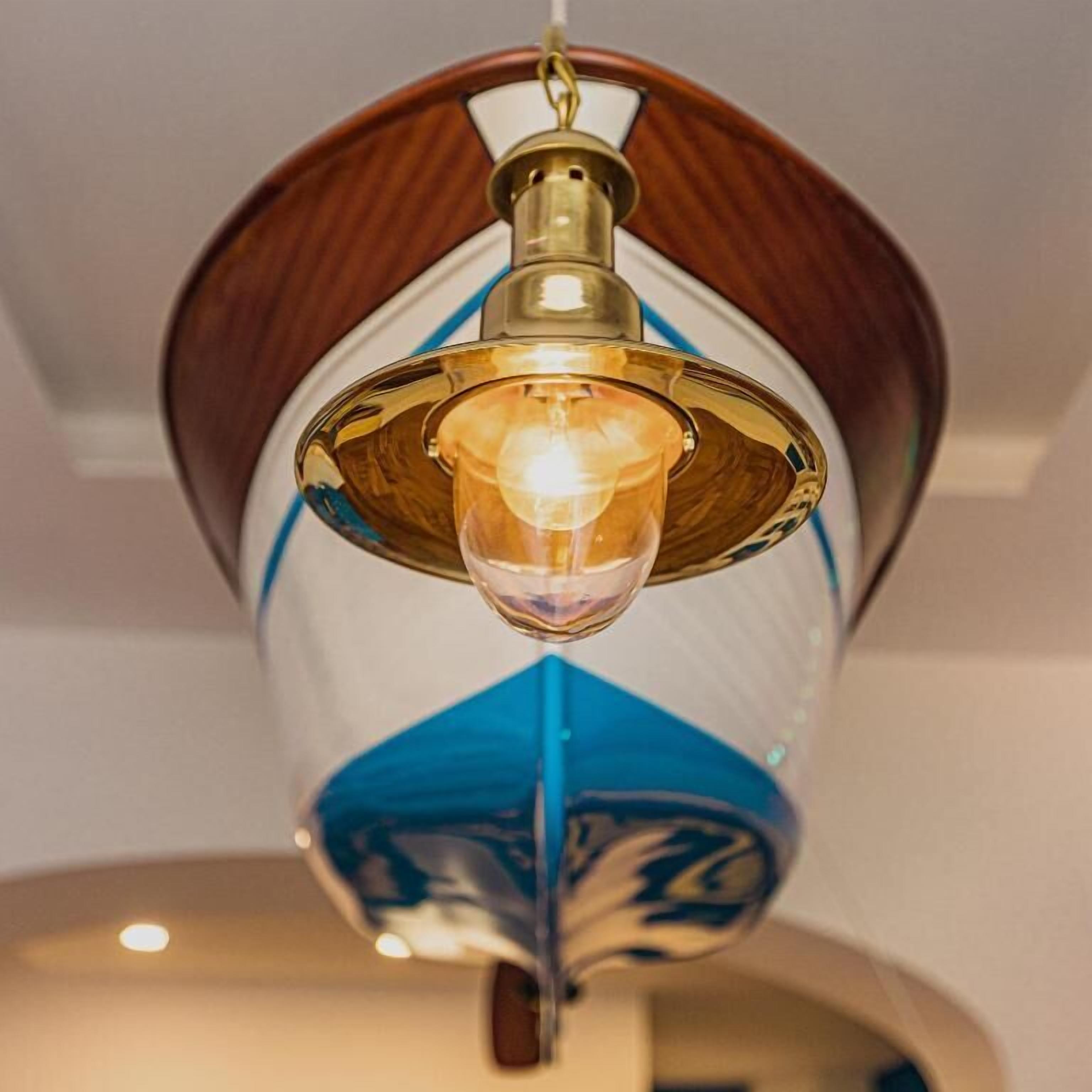 A ceiling light fixture with a wooden and glass design.