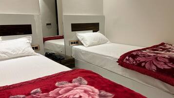 Quarto standard | Quartos à prova de som, Wi-Fi de cortesia, roupa de cama