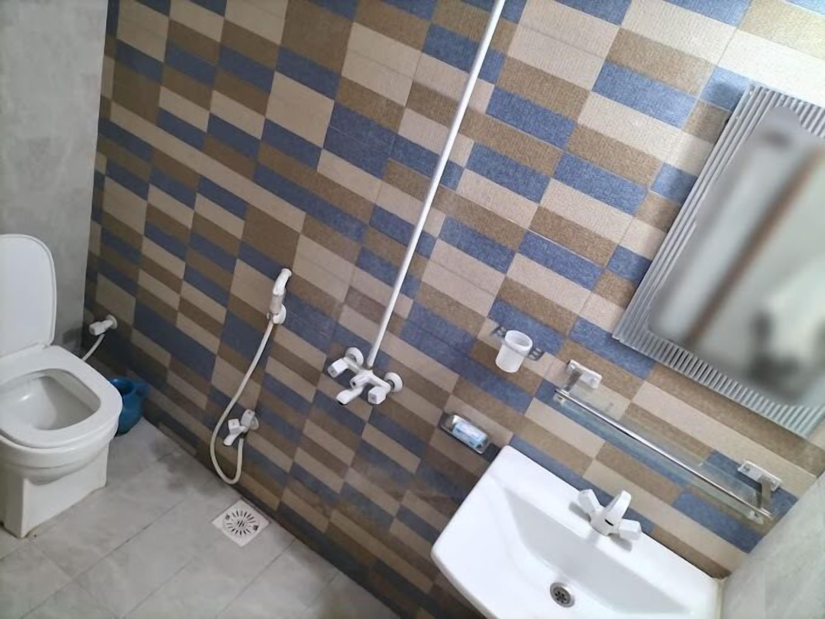 Shower, designer toiletries, towels, soap