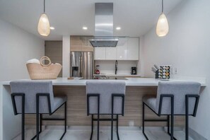 Fridge, oven, stovetop, dishwasher - Find peace in this 2 BD condo (El tezal)