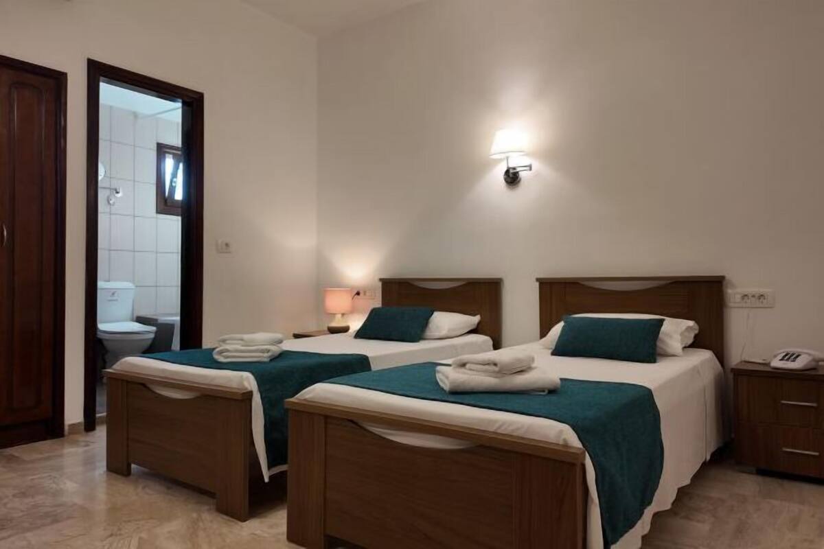 Iron/ironing board (on request), WiFi (free), bed sheets